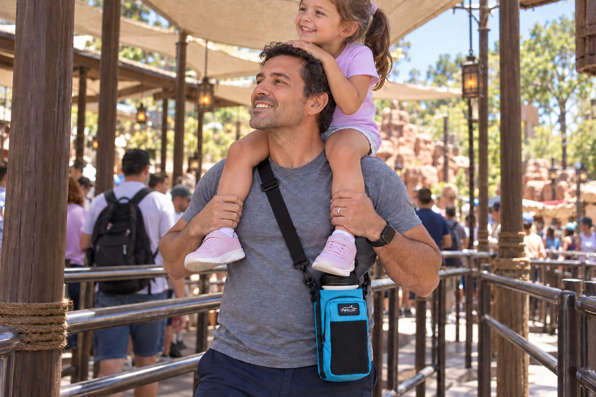 Dad carrying his daughter on his shoulders, Hydro Carrier across his body