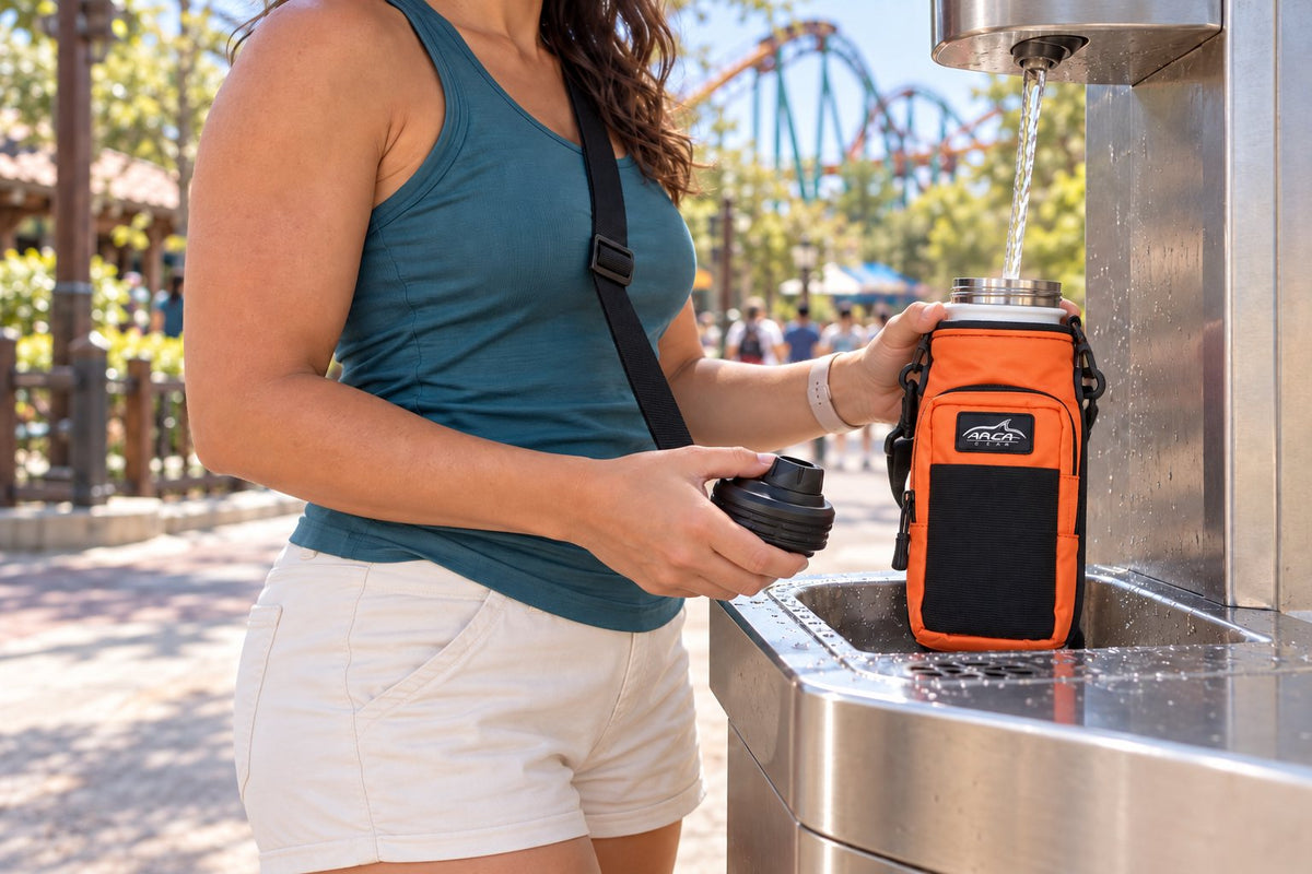 Refilling a bottle at a park water fountain without taking off the carrier